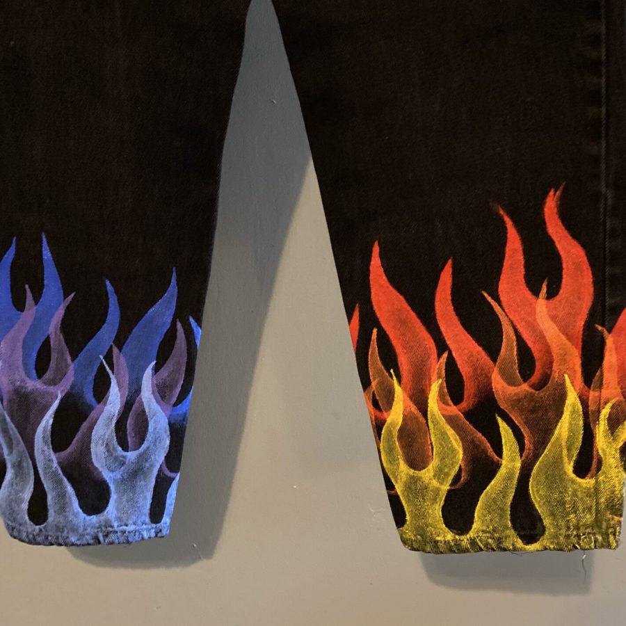 Hand painted & silkscreened clothing like these “Flame Jeans”