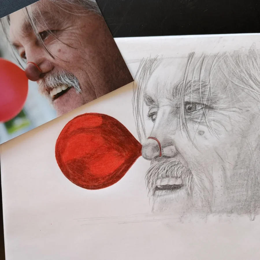 Color pop pencil sketch of man with balloon on nose
