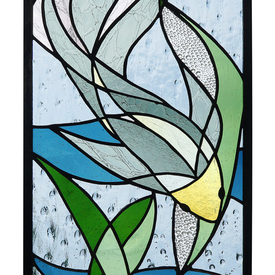 Swimming in the Rain - This piece  reveals the world below,  always in motion.  Made with antique  glass, this piece  incorporates soothing  grey and green tones to  capture the clean cool  feeling of swimming  beneath the surface.
