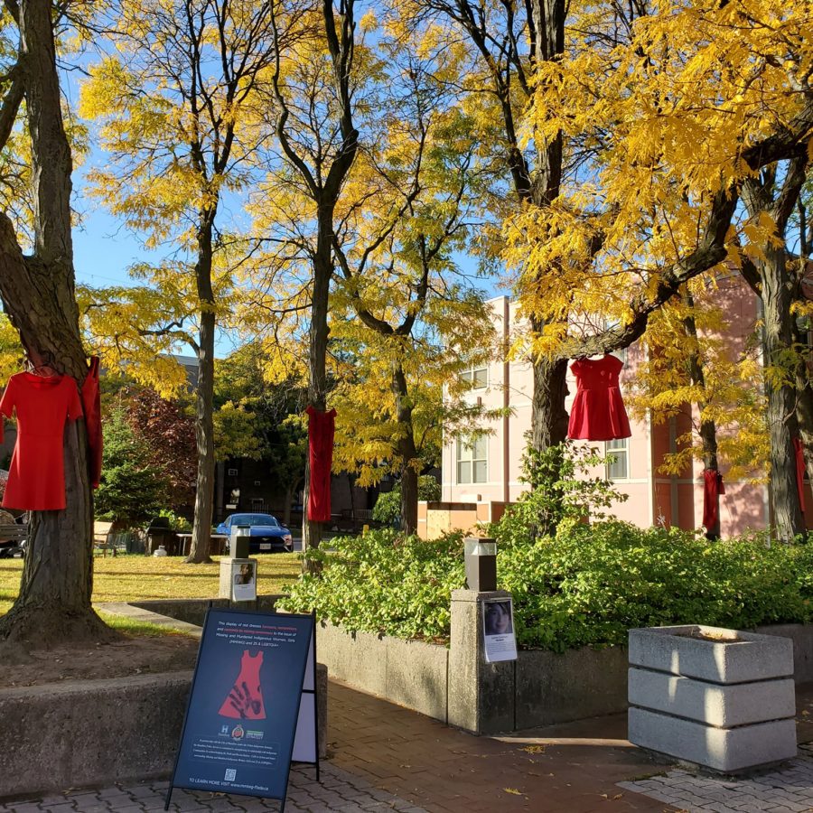 Display of Red Dresses in honour of the Missing and Murdered Indigenous Women.