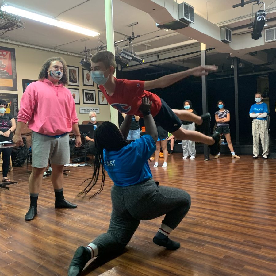This image is Mason teaching stunts to students in Frozen Jr. with Theatre Ancaster, 2022.