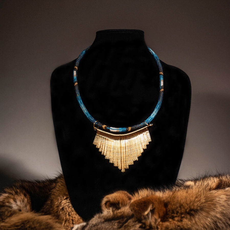 Peyote stitched necklace with feather design.