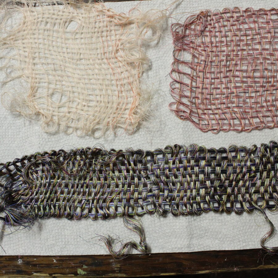 Weaving sample with sewing thread 