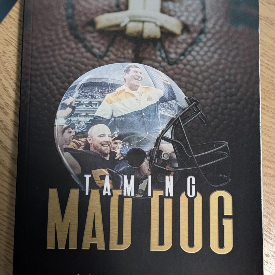 A photo of the cover of my non-fiction book, Taming Mad Dog