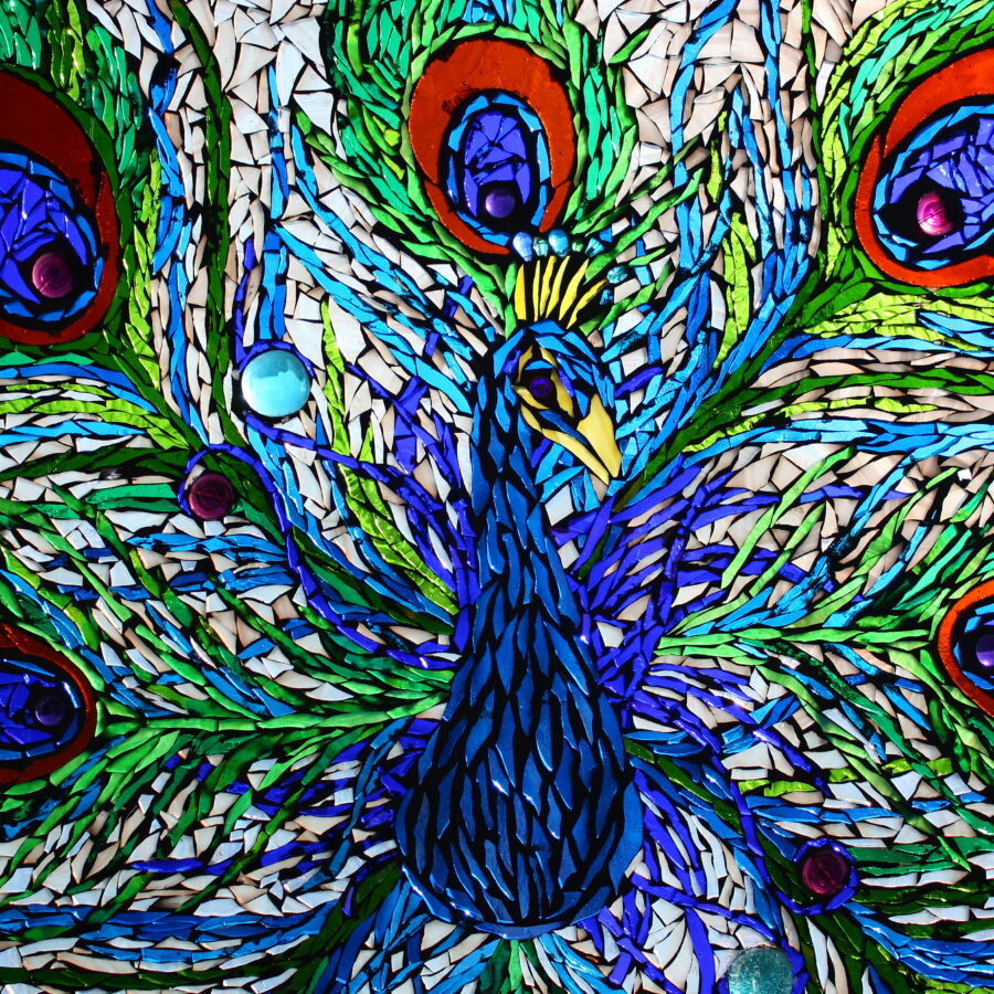 This is a closeup of the detailed mosaic work I can create with tiny fragments of glass in my Peacock Design.